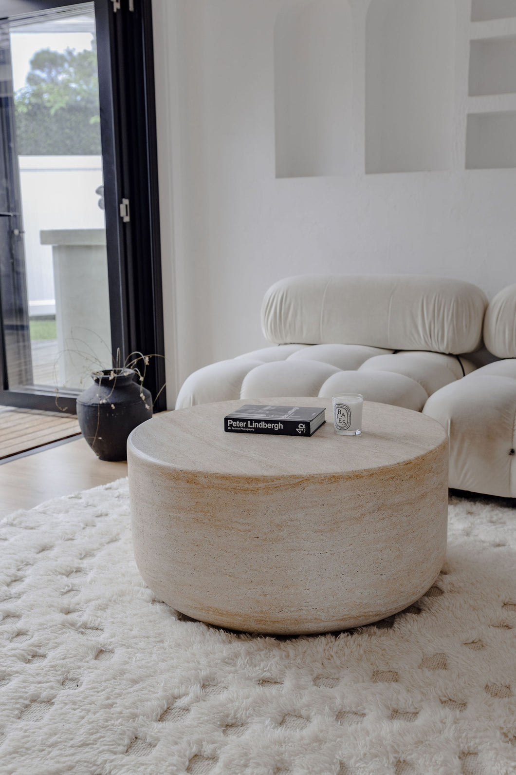The travertine Curve coffee table