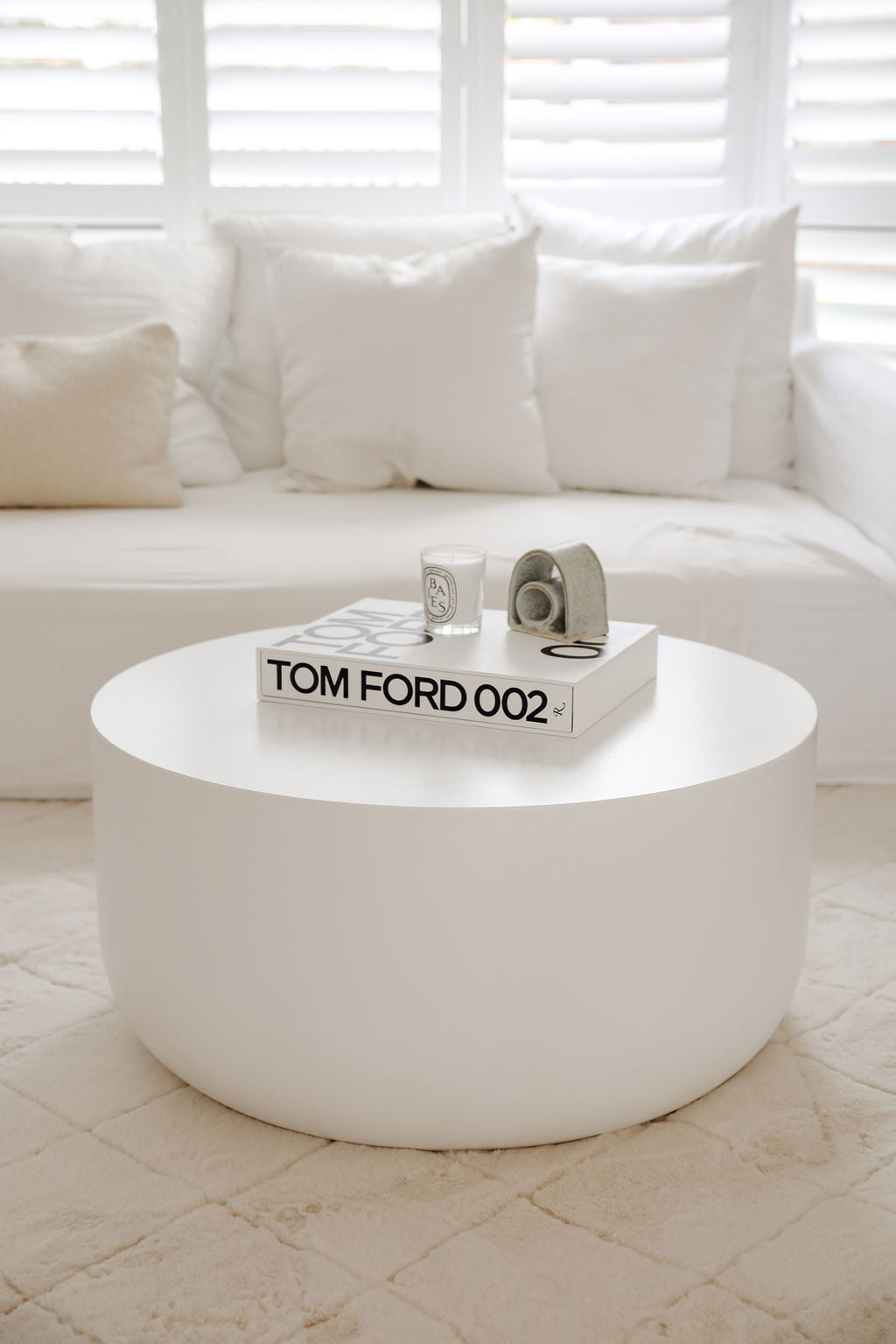 Round white cement coffee table discount