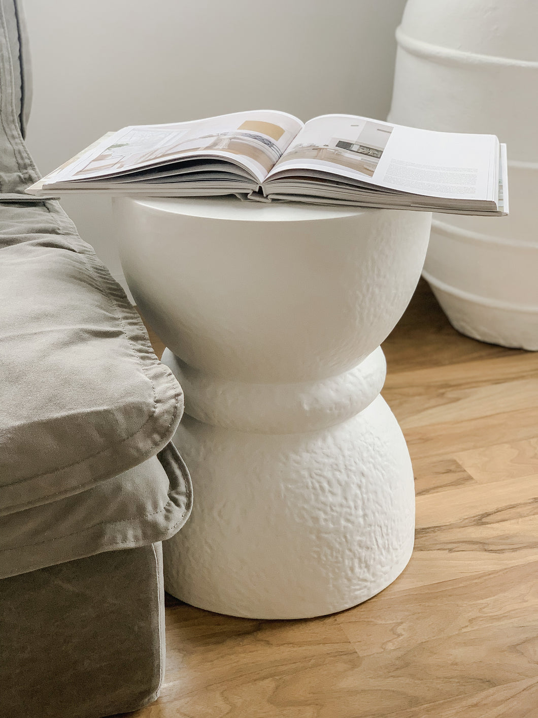 The hourglass side table - pure white textured concrete - pre order 12-14 weeks